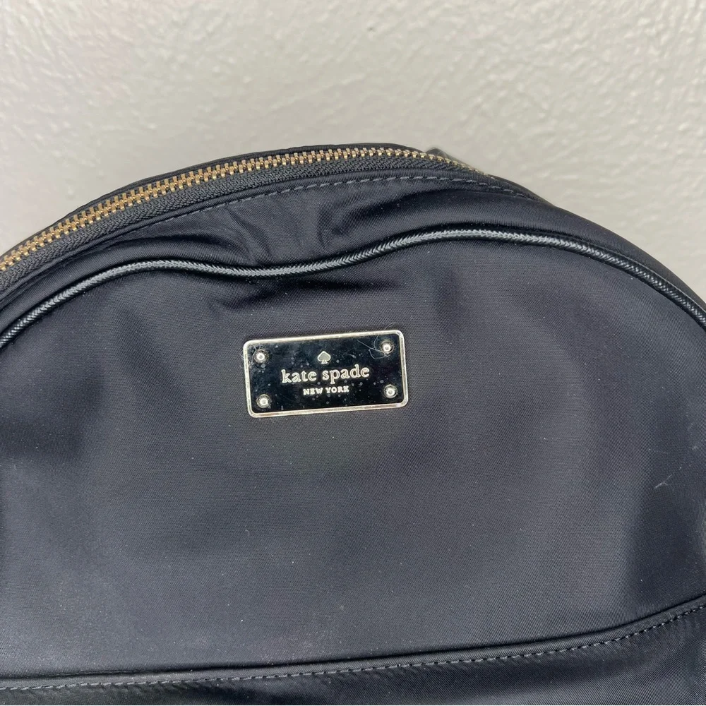 Kate Spade black gold zippers back pack